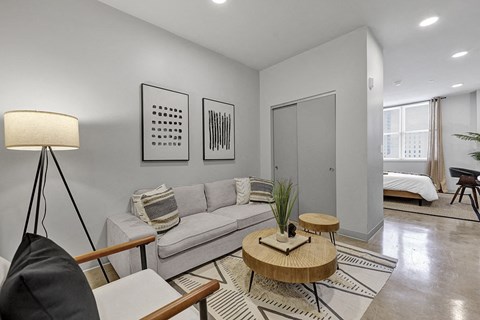 a living room with a couch and a table