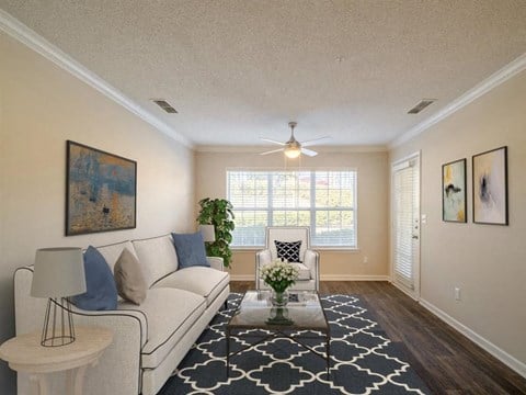 a living room with a couch and a coffee table
