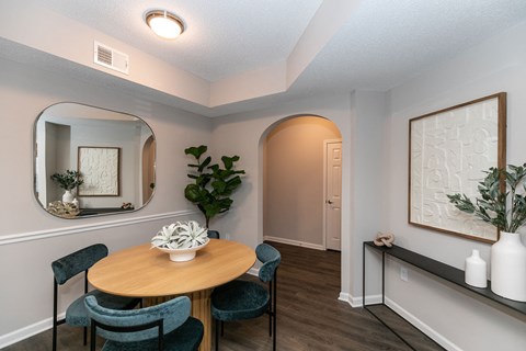 a dining room with a table and four chairs at Willowest in Lindbergh, Atlanta
